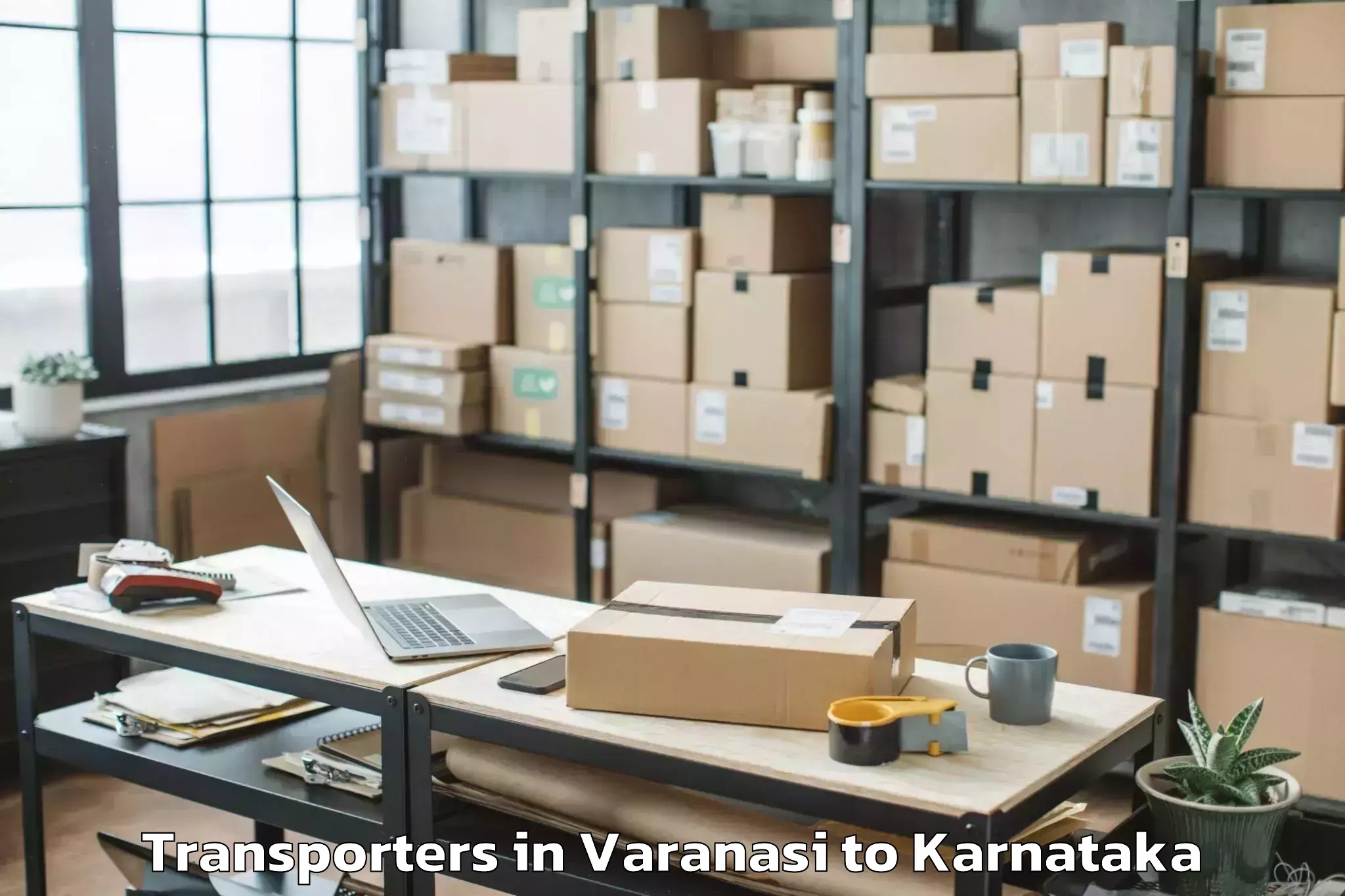 Reliable Varanasi to Karnataka State Law University Transporters